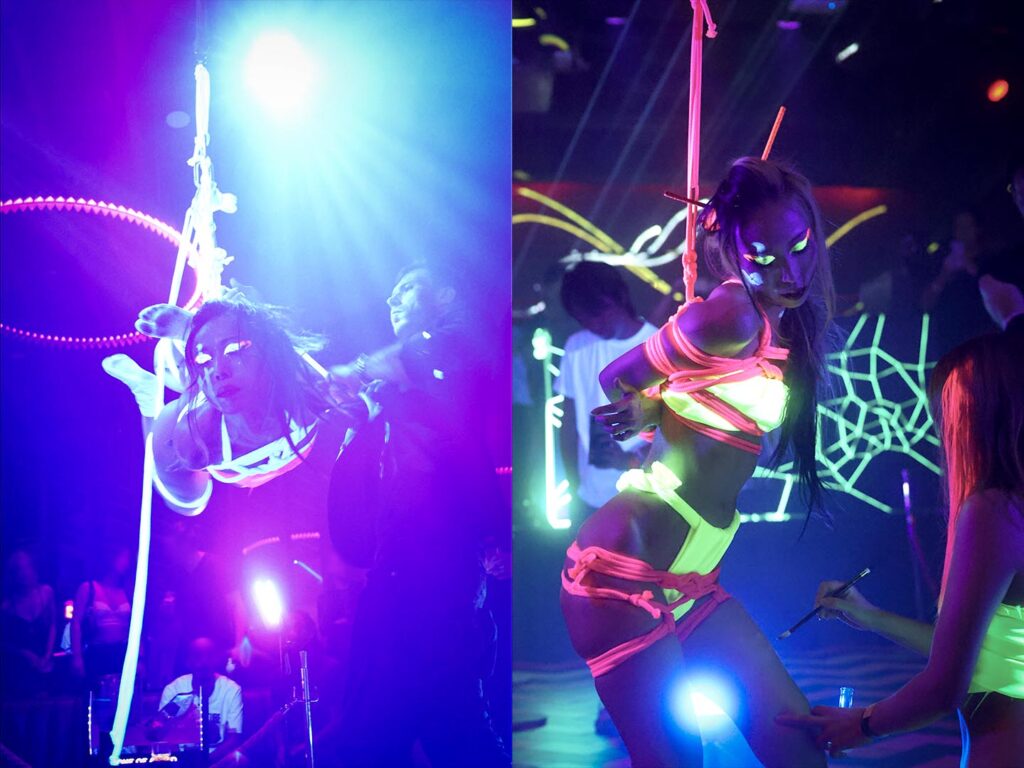UV rope show in a Tokyo nightclub with glowing body paint and neon ropes.