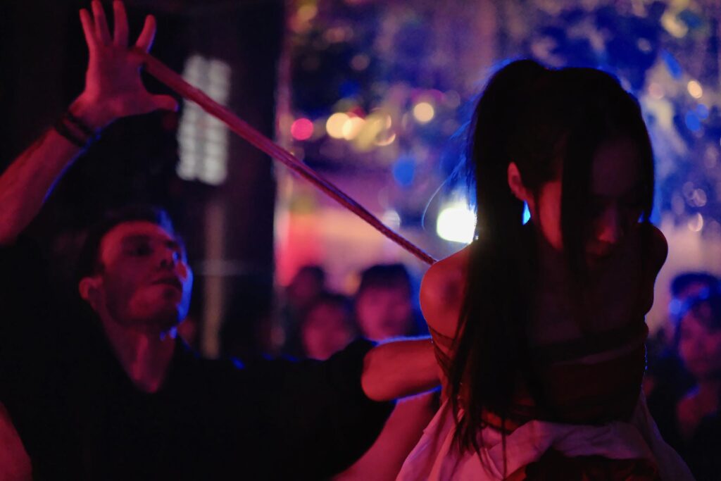 Shibari performance by Louis Kordexe with model Kiyome during a Tokyo club show.
